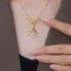 elegant gold plated fan necklace for women | stylish statement jewelry